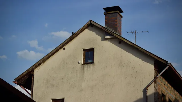 Brick chimney masonry on a South Florida rooftop